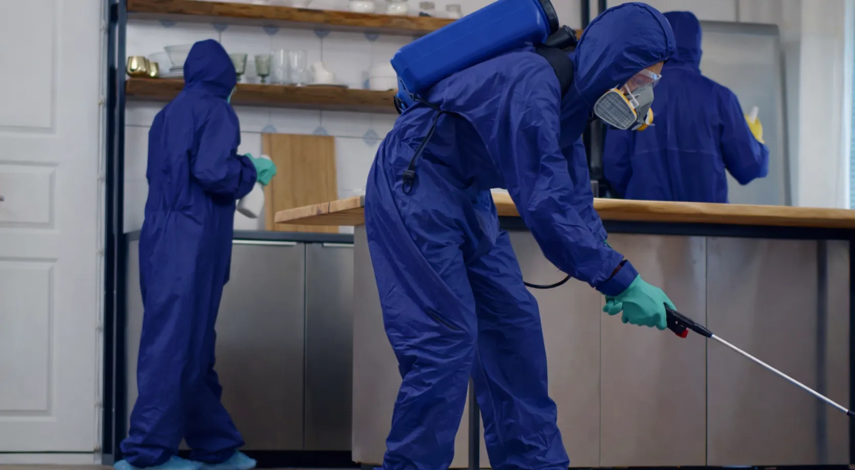 Professional commercial pest control team performing deep sanitization in a Los Angeles business facility.